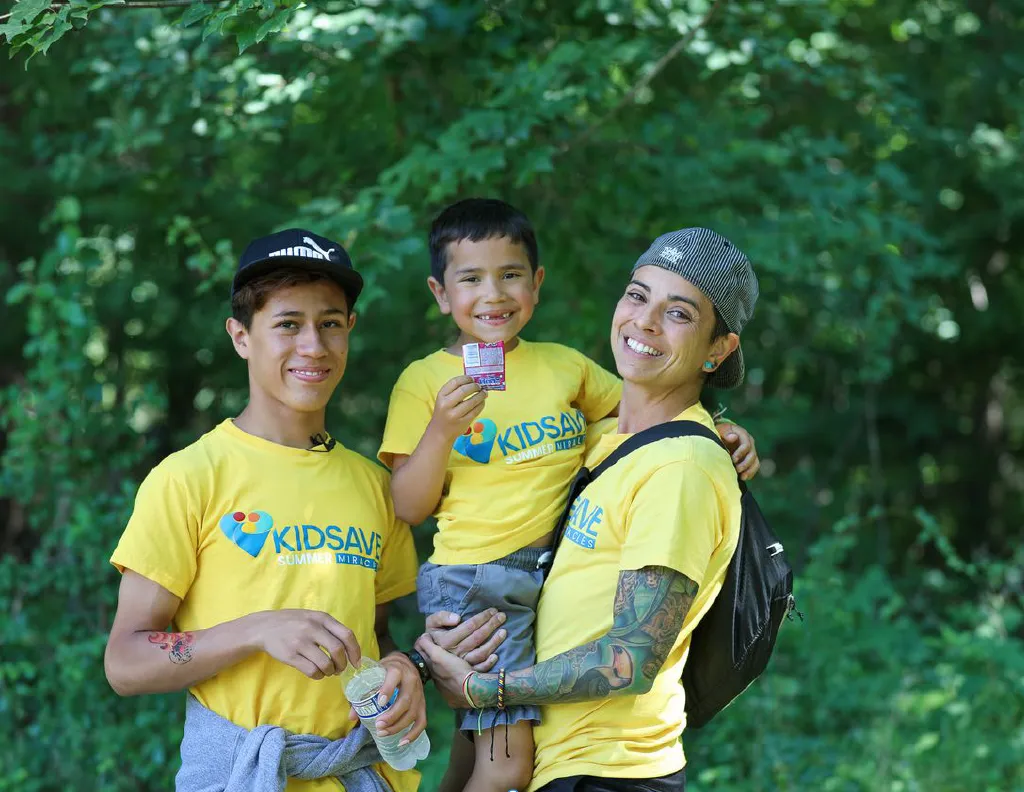 Andrea Uribe with their foster-children Ethan, 13, and Julian, 6, at a KIDSAVE event on July 31, 2021. (StatenIsland Advance/Alexandra Salmieri)